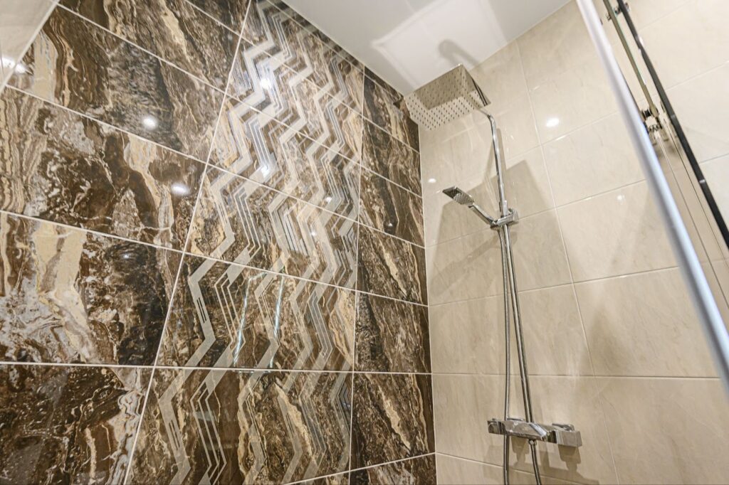 how much does it cost to reglaze a shower